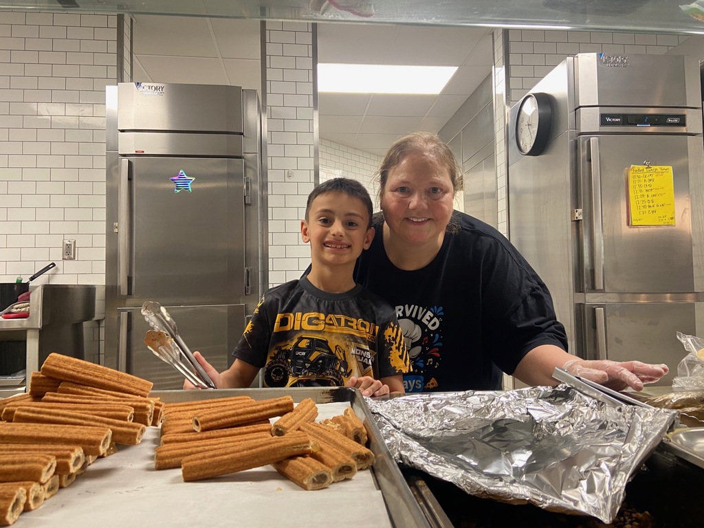 Student helper in kitchen