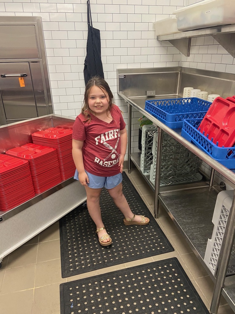 Student helper in kitchen