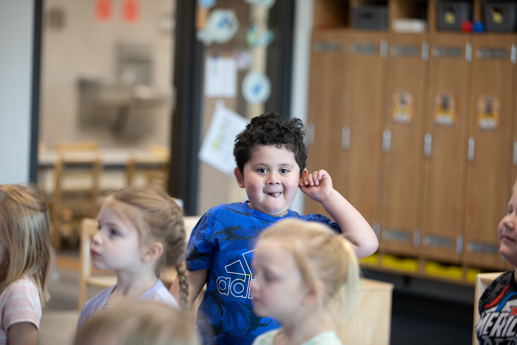 student sticking his tongue out