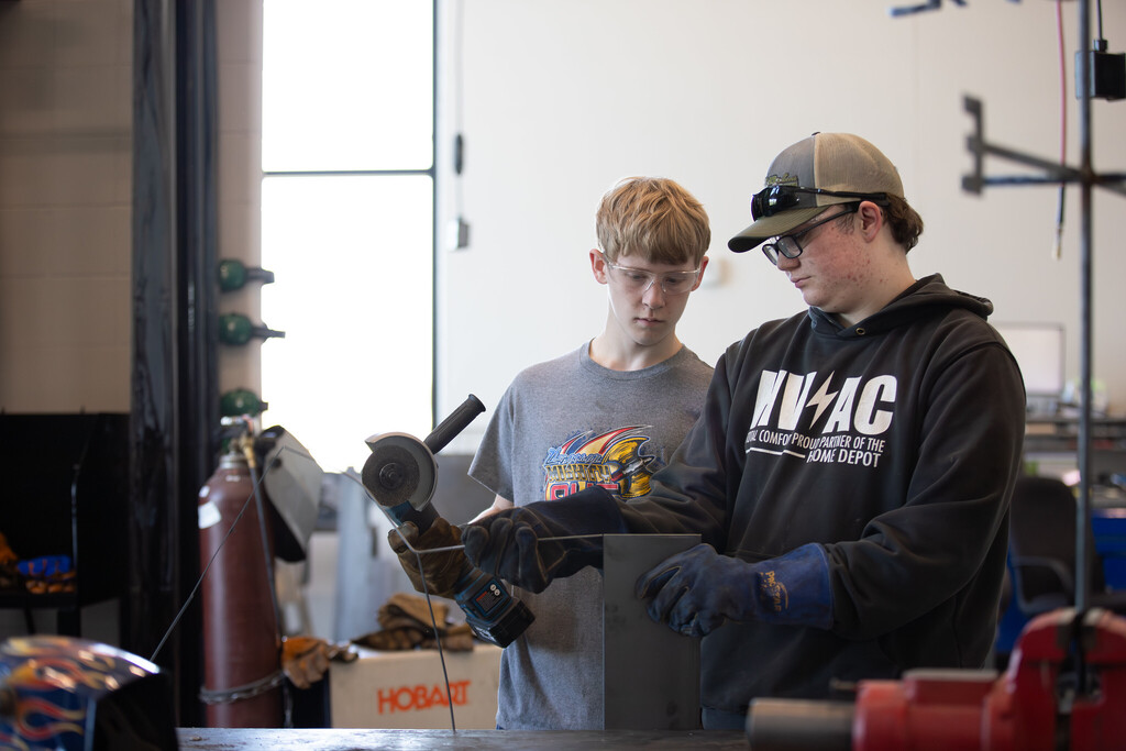 students working in shop