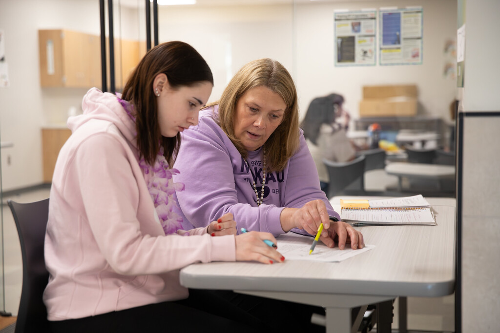 teachers and staff members in class