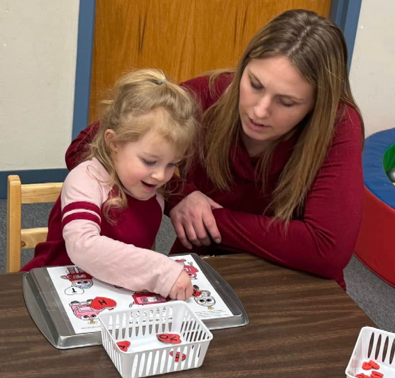 Parent and child playing