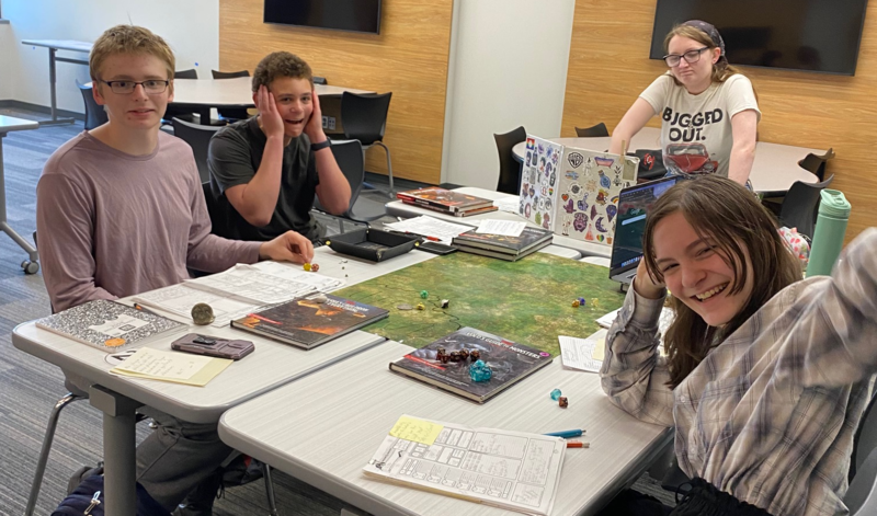Students playing dungeons and dragons
