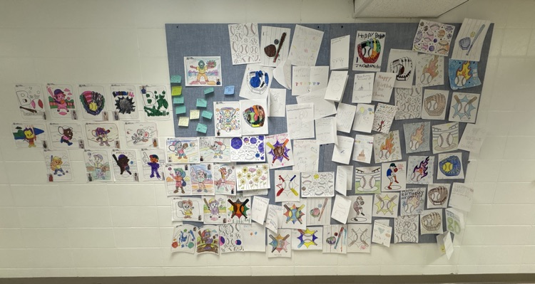 a second bulletin board filled with happy birthday cards