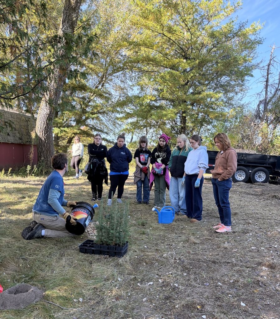 The Ecology Club planting trees at Crossroads