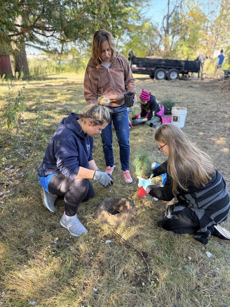 The Ecology Club planting trees at Crossroads
