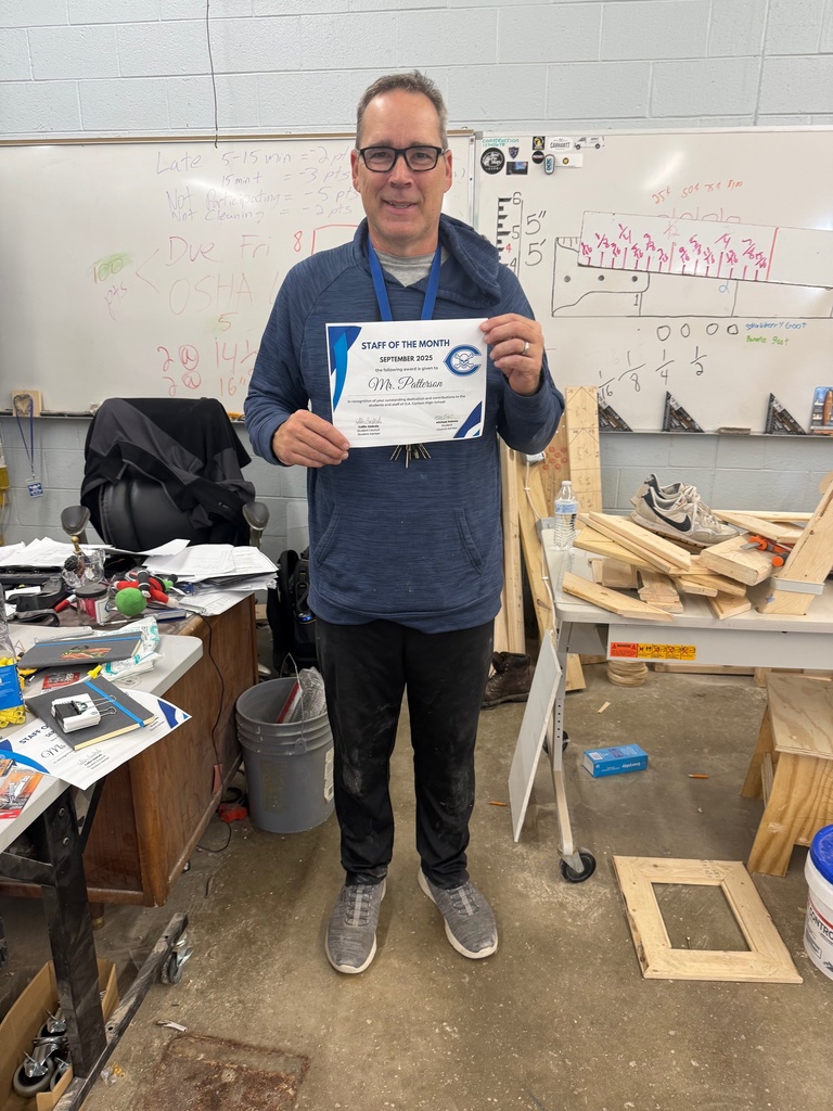 Mr. Patterson with award