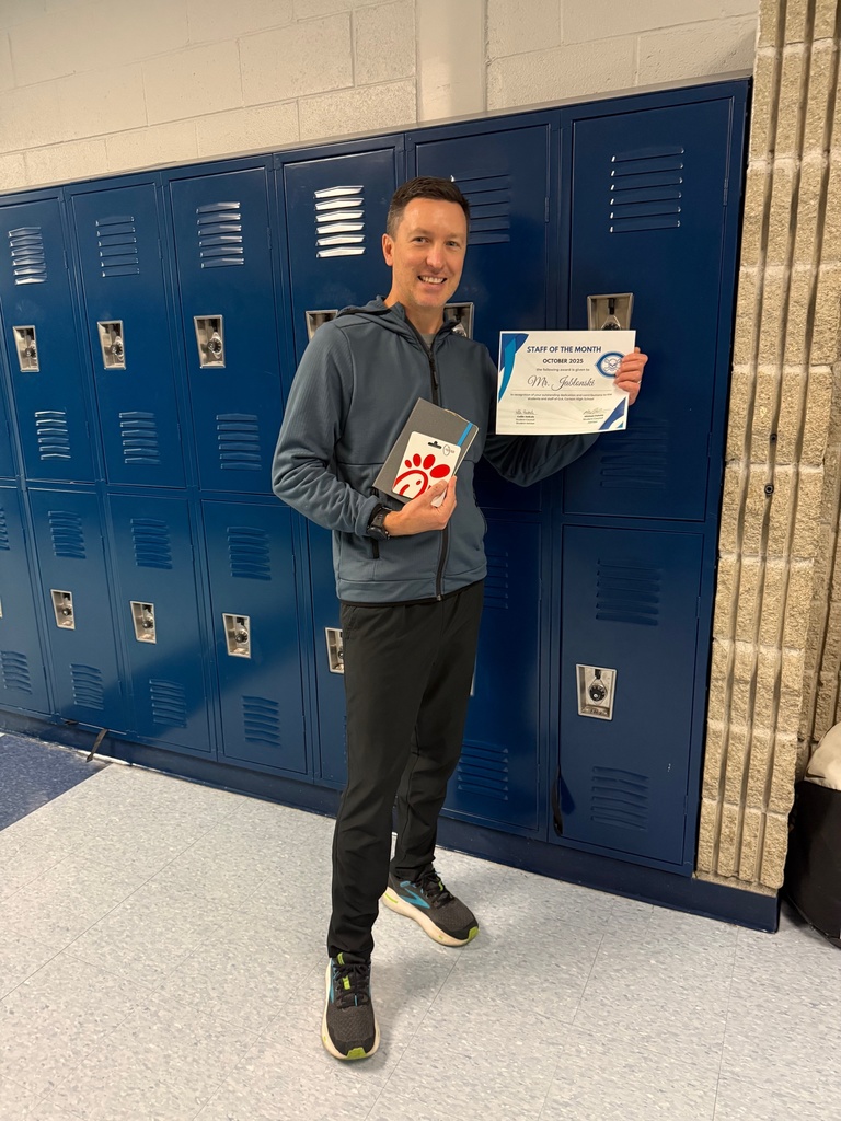 Photo of Mr. Jablsonski with award