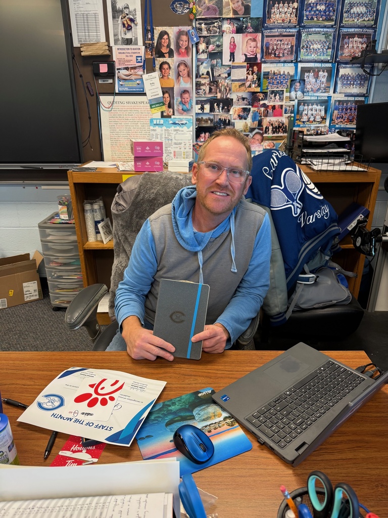 Mr. Warren with award