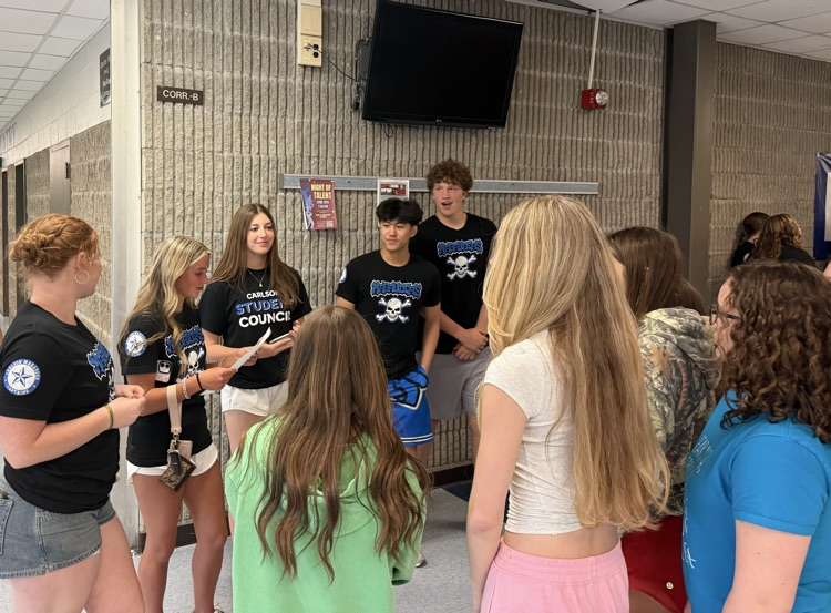 current Carlson students giving building tours to incoming eighth grade students
