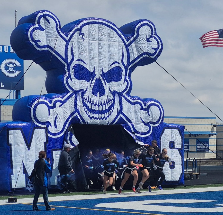 girls running out of tunnel 