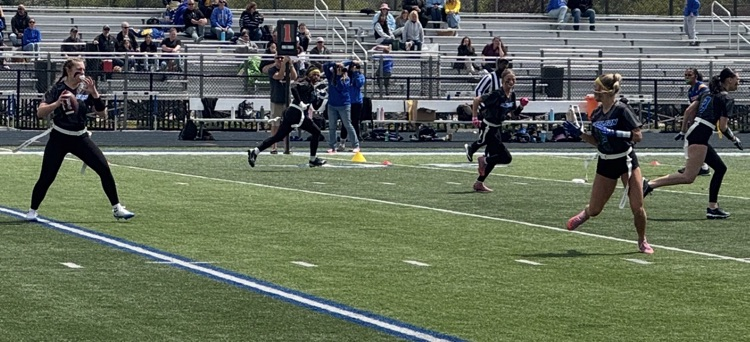 girls playing flag football 