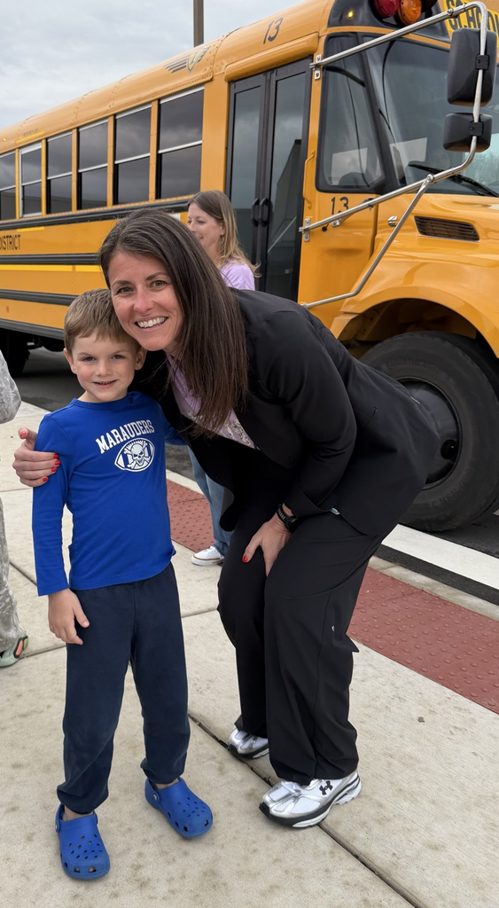 future kindergarten student posing with Hunter principal