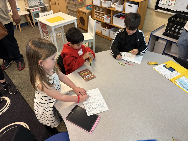 several future kindergarten students working on a Craft