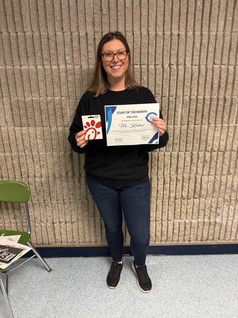 Ms. Kershaw holding an award