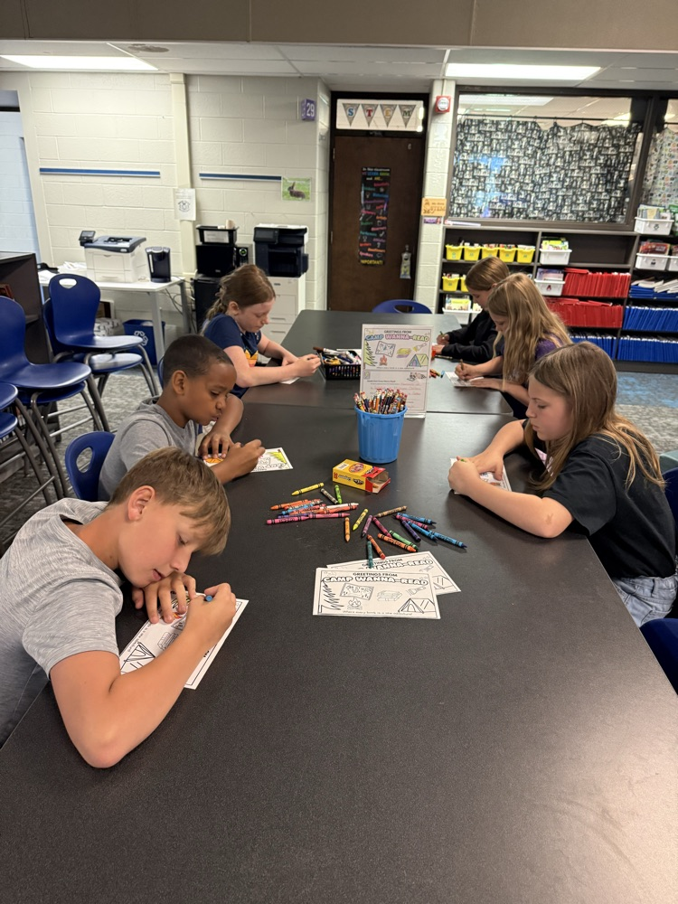 Image of students at stations in library