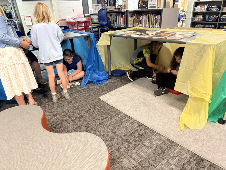 Image of students at stations in library