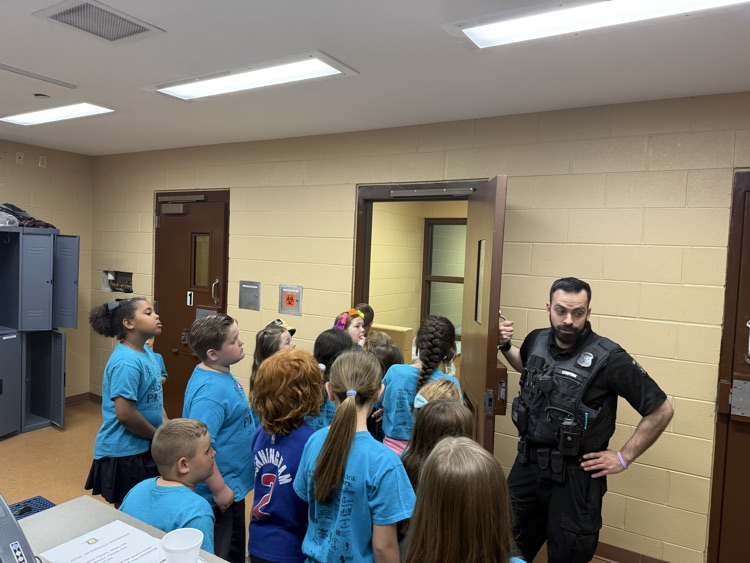 students learning about the police department 