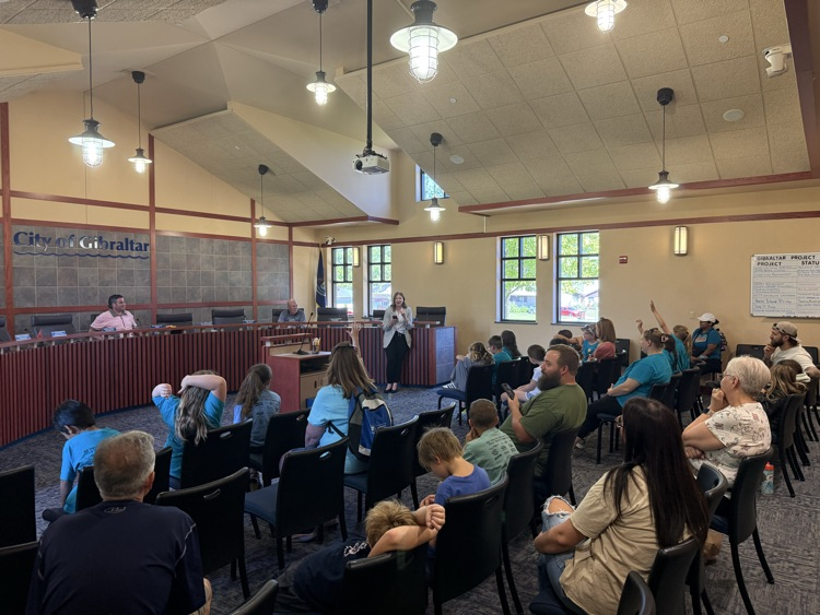 students asking questions to the City Council