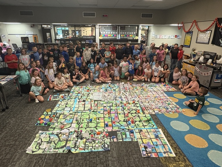 third grade students with their geometry cities