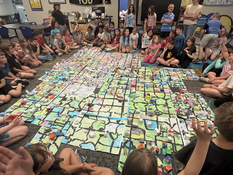 Image of third grade students with their geometry cities