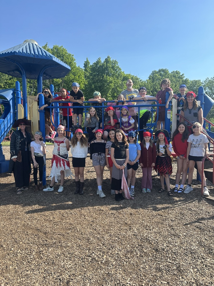Image of fourth grade students dress up as pirates on the playground.