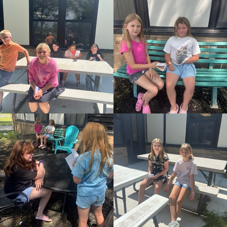 Image of fourth grade students meeting with third grade students