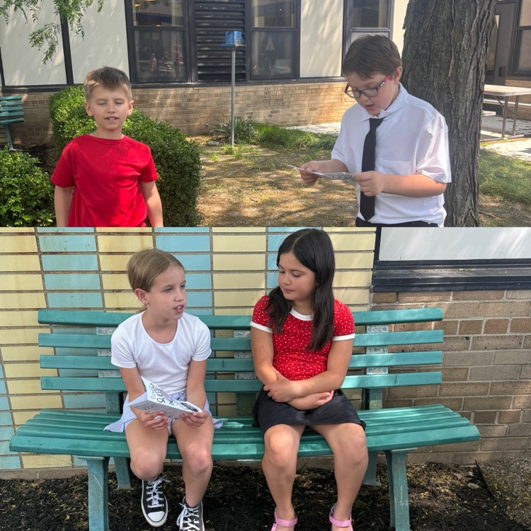 Image of fourth grade students meeting with third grade students