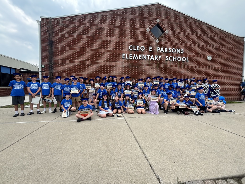 Fifth grade students at graduation outside elementary school