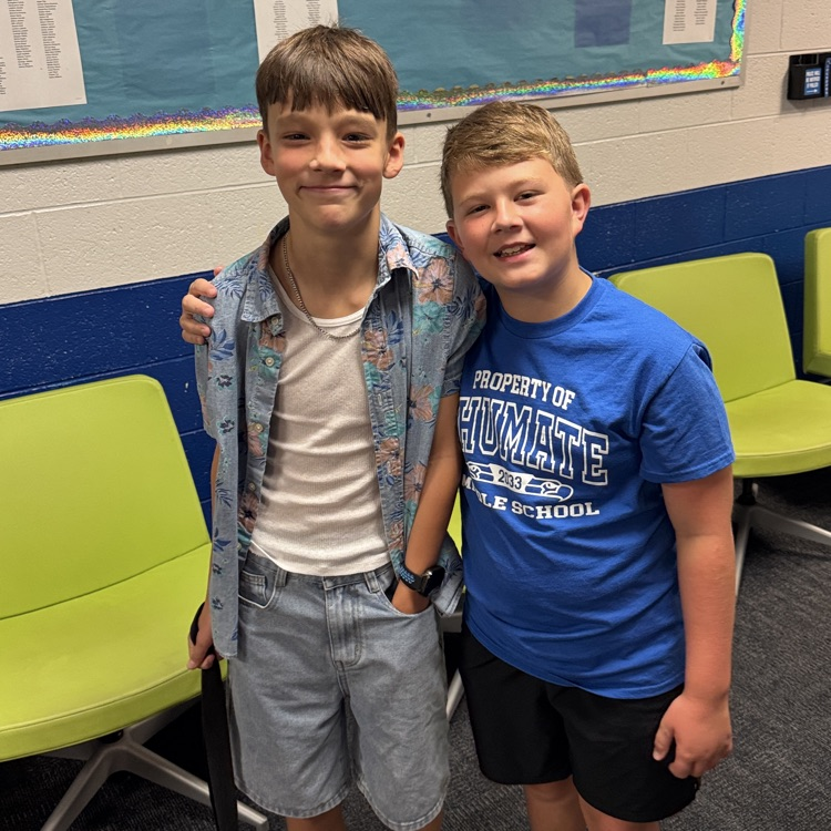 two students standing together