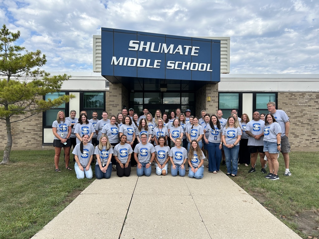 SMS Staff in front of the Shumate Middle School building
