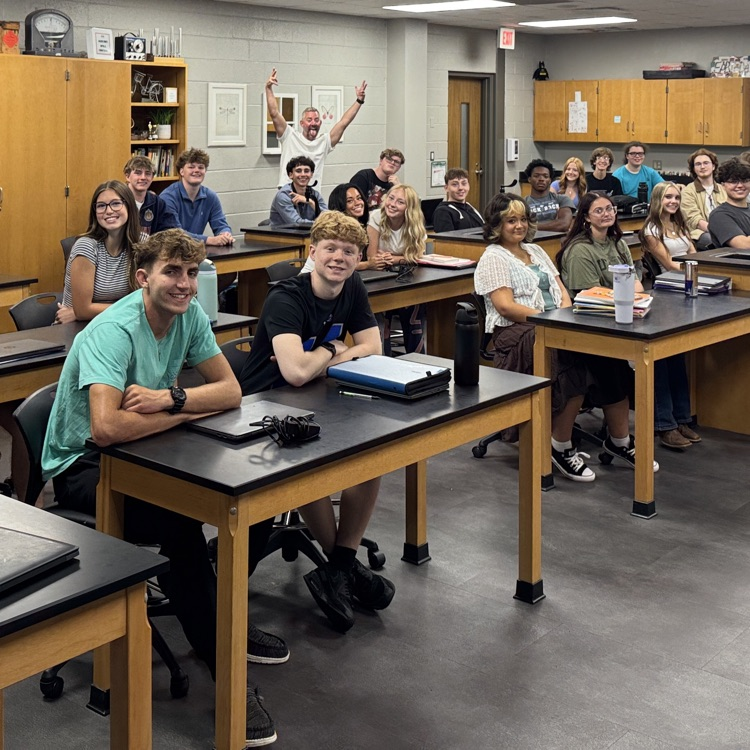 students and teacher and a science classroom at the high school