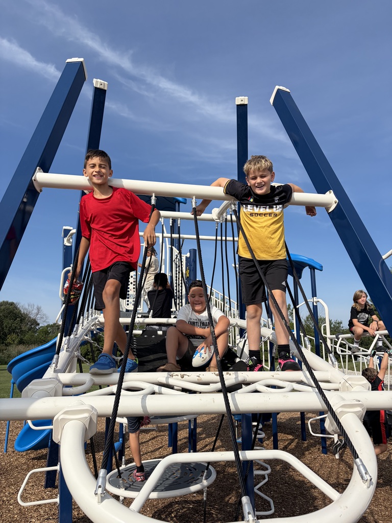 Three fifth grade boys on the new playground