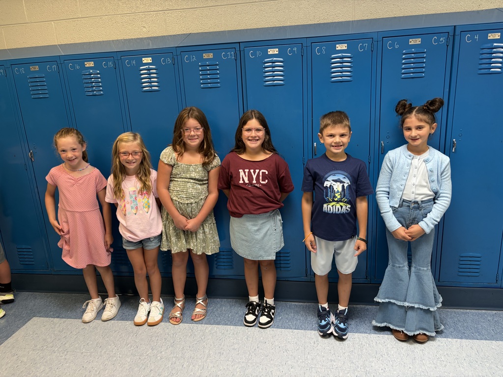 Second grade students in a line in the hallway