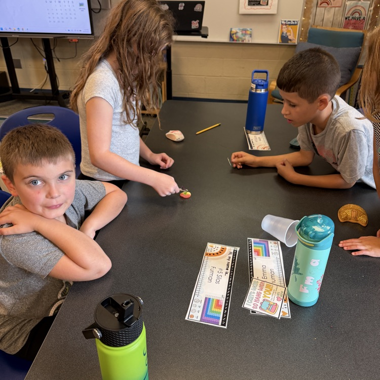 Students work together during a “Saving Fred” activity, using teamwork, communication, and problem-solving skills to rescue Fred without using their hands.