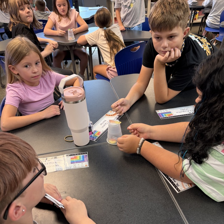 Students work together during a “Saving Fred” activity, using teamwork, communication, and problem-solving skills to rescue Fred without using their hands.