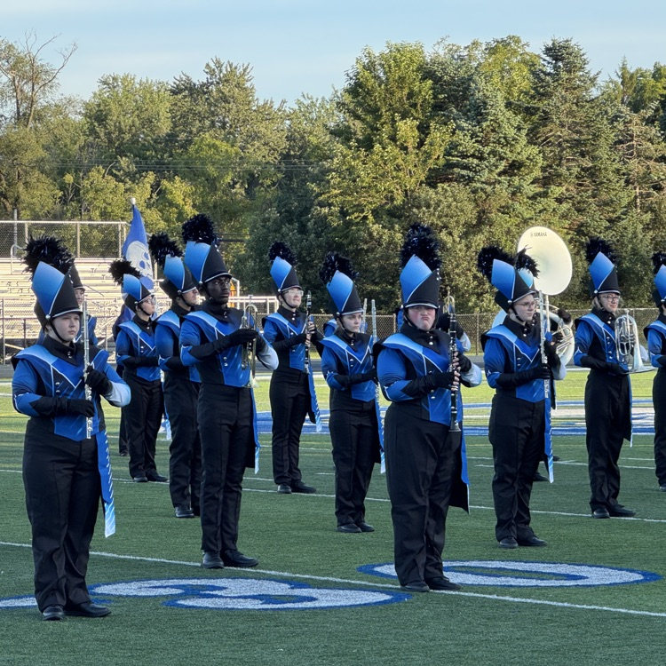 Carlson marching band performing the national anthem