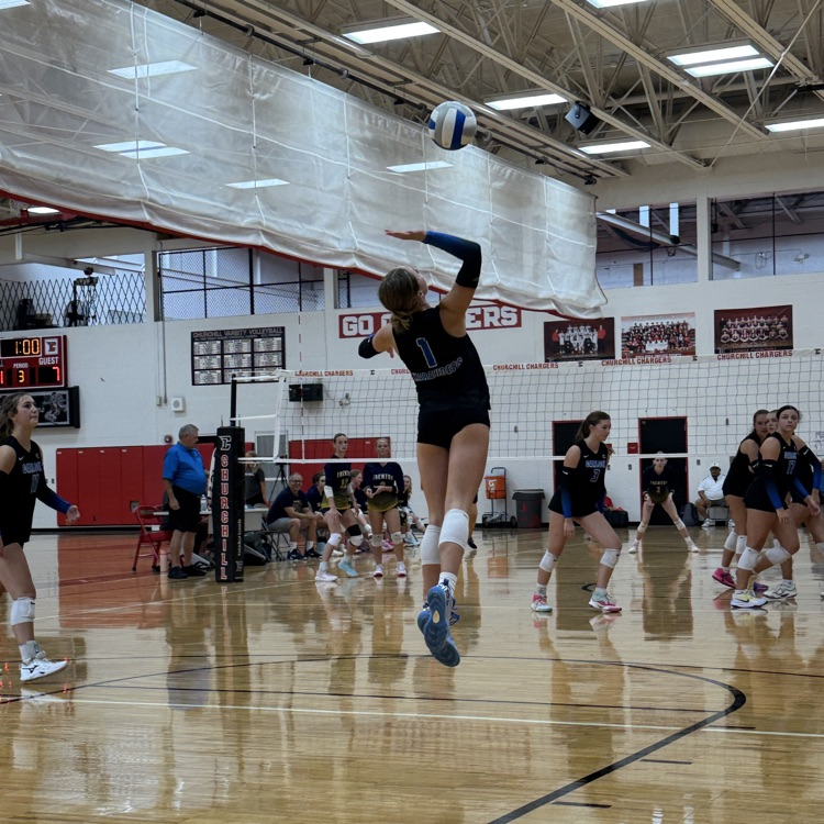 CHS serving volleyball