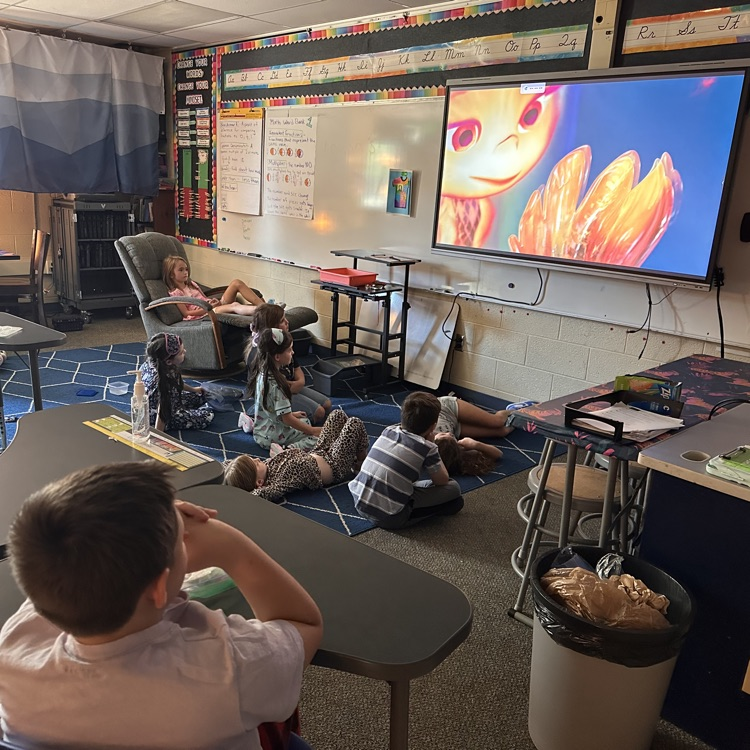 Students sit in their classroom enjoying snacks while watching a movie during Chapman’s PBIS Movie Theater.