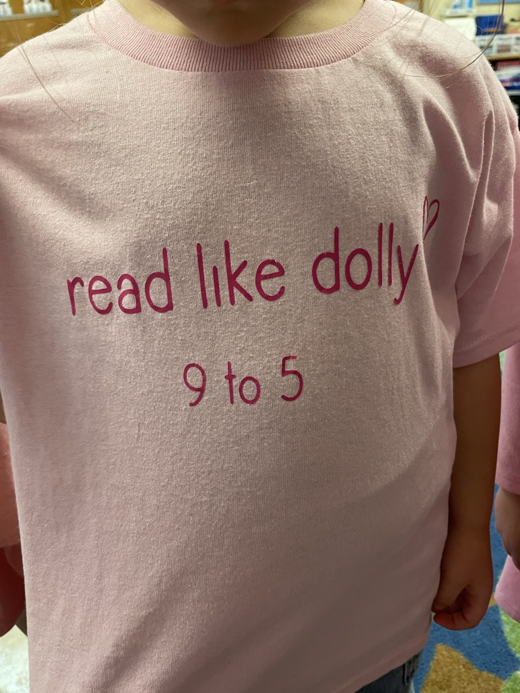 Students and teachers throughout Chapman Elementary smile for photos while wearing pink for Dolly Parton Day on September 25.