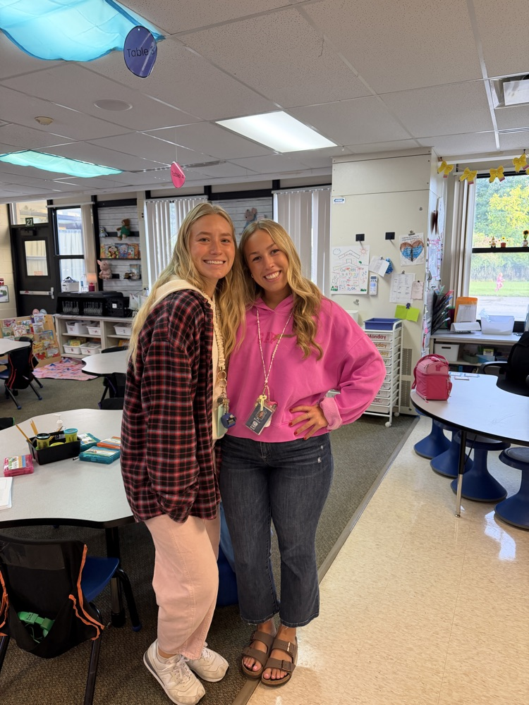 Students and teachers throughout Chapman Elementary smile for photos while wearing pink for Dolly Parton Day on September 25.