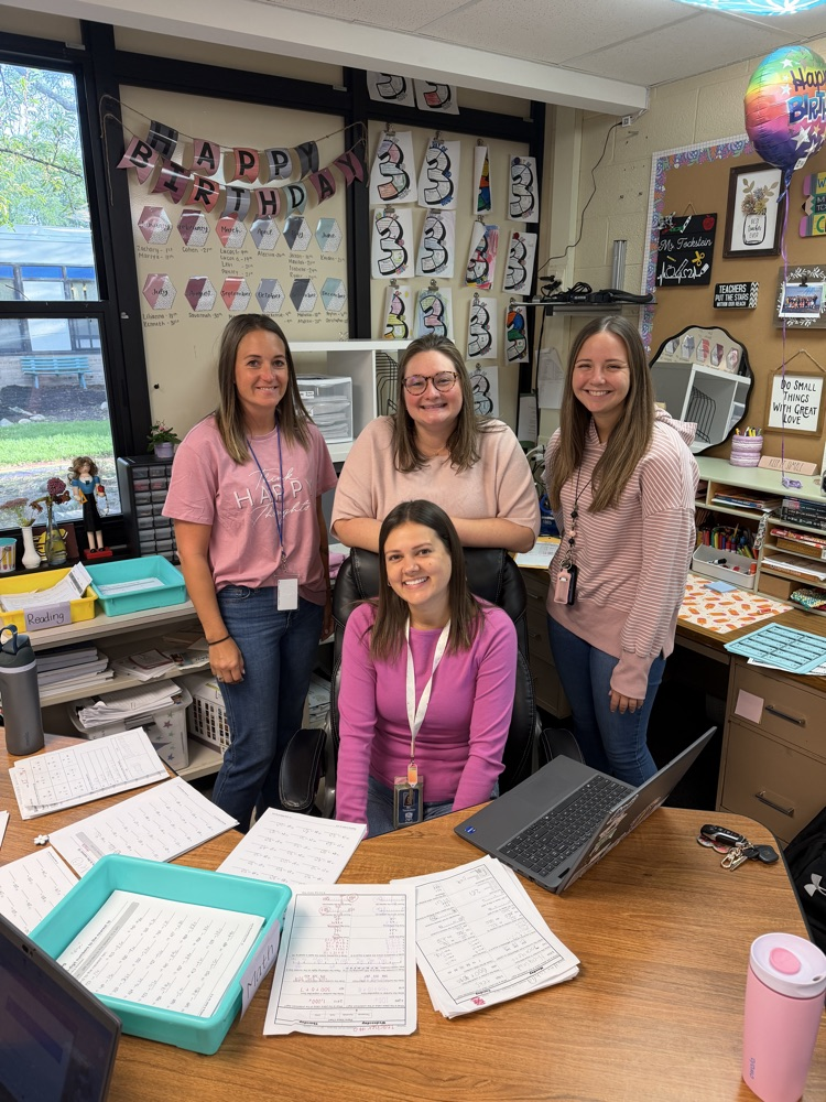 Students and teachers throughout Chapman Elementary smile for photos while wearing pink for Dolly Parton Day on September 25.