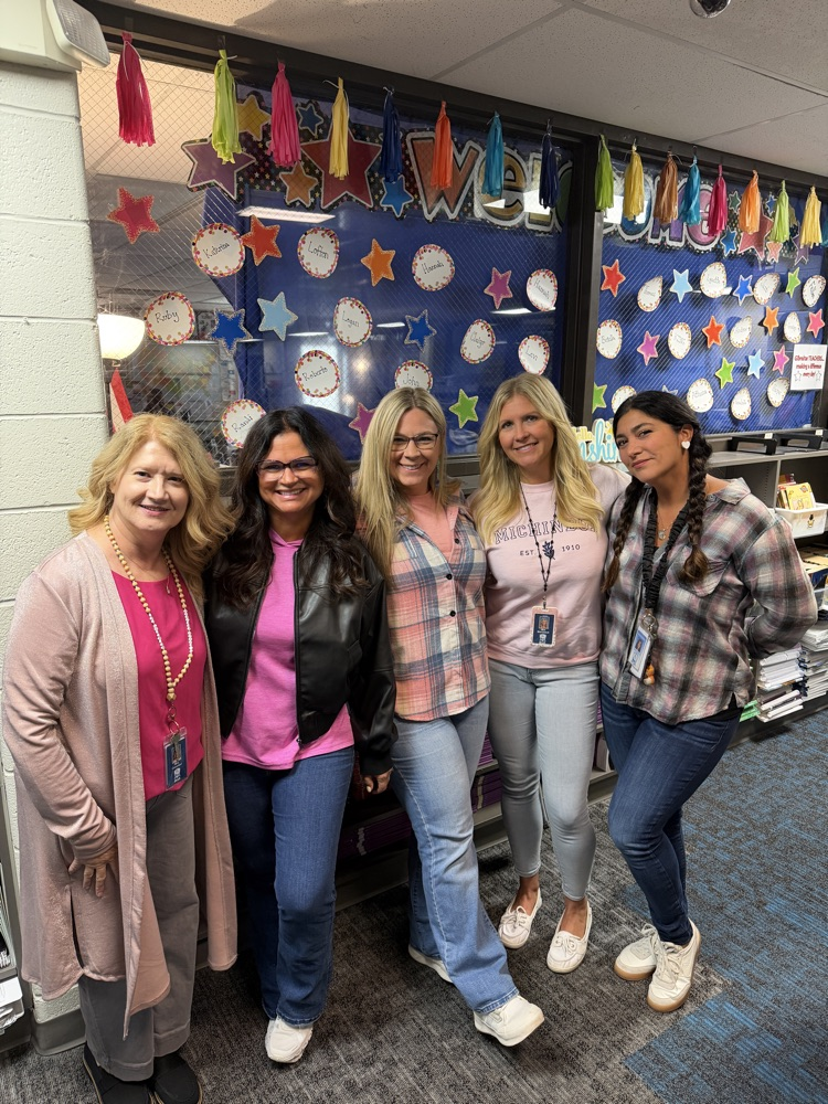 Students and teachers throughout Chapman Elementary smile for photos while wearing pink for Dolly Parton Day on September 25.