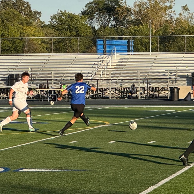 kicking soccer ball
