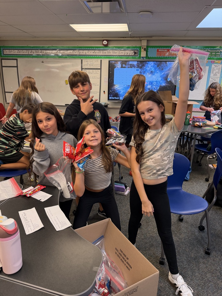 students packaging treats