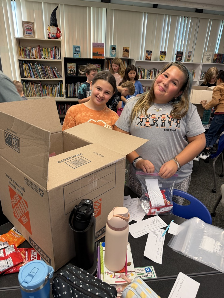 students packaging treats