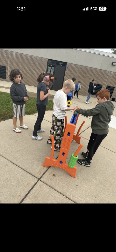 Students enjoying the September PBIS Party by playing outdoor yard games with their classmates.