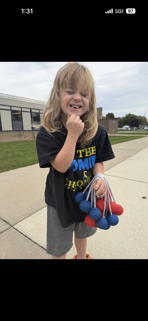 Students enjoying the September PBIS Party by playing outdoor yard games with their classmates.