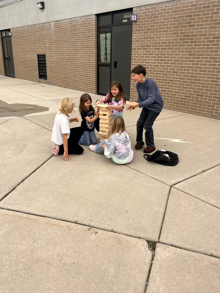 Students enjoying the September PBIS Party by playing outdoor yard games with their classmates.