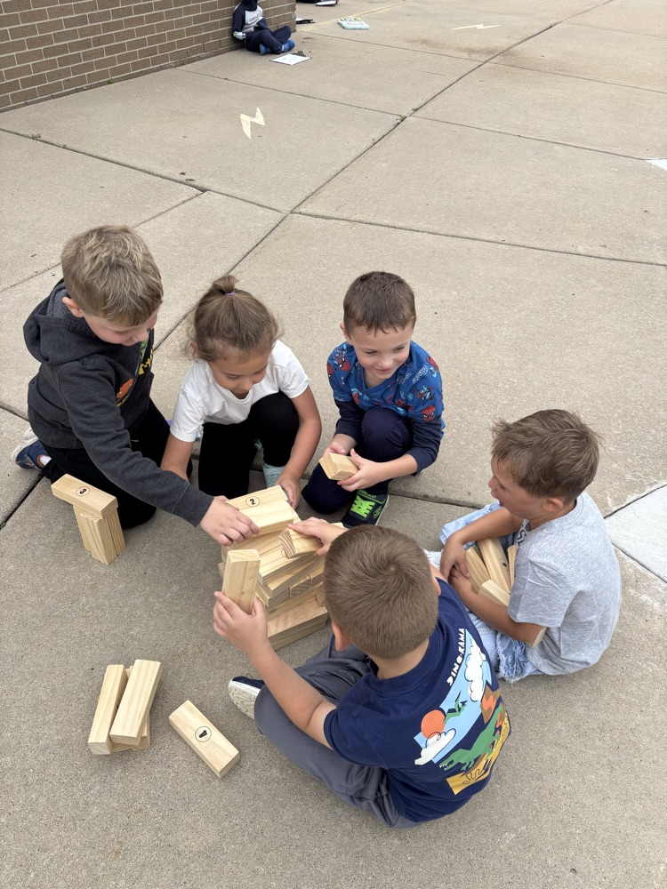 Students enjoying the September PBIS Party by playing outdoor yard games with their classmates.